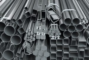 Different metal rolled products. Stainless steel profiles and tu
