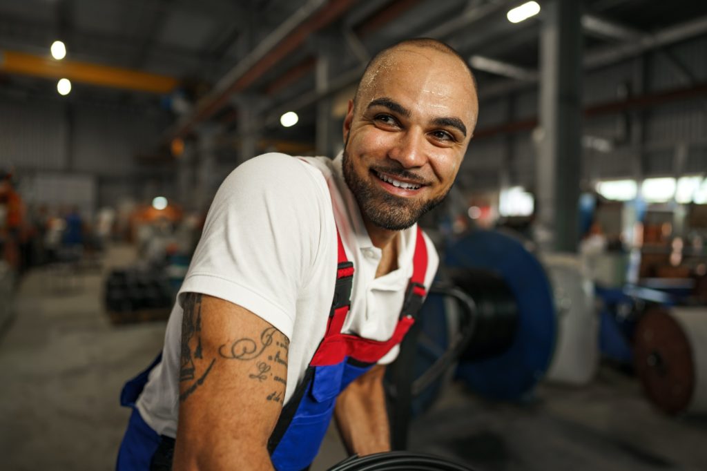 Portrait of a smiling handsome african american factory worker